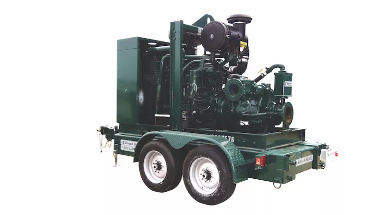 green towable pump on four wheels