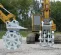 Gray Furukawa Compaction Wheel Attachment for Excavator