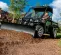 Green and black John Deere snow plow