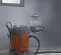 Orange and black HUSQVARNA Wet/Dry Portable Vacuum, 10-14 gal.