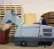 Gray Nilfisk ride-on scrubber
