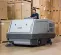 Gray Nilfisk ride-on scrubber