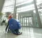 Blue Nilfisk Battery Powered 28 inch Walk-Behind Floor Scrubber