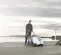 White and black Nilfisk 36 inch gas powered Walk-behind Sweeper