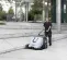 White and black Nilfisk 36 inch gas powered Walk-behind Sweeper