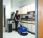 Blue and black NILFISK Walk-Behind Power Scrubber, 12 in., Battery Powered