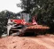 Red Takeuchi Compact Track Loader