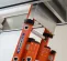 Silver and orange ABATEMENT HEPA Dust Containment Cart