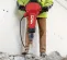Red and black HILTI Demolition Breaker Hammer, Electric-powered, 60 lbs.
