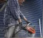 Orange, black and silver HUSQVARNA Air Concrete Saw, 12-14 in.