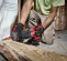 Red and black MILWAUKEE Reciprocating Saw, Cordless, Electric Powered