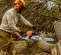 Orange, gray and black STIHL Chainsaw, 20 in., Gas Powered