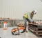 Orange and white Stihl 12 inch concrete cut-off saw