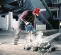 Green and black Bosch Demolition Hammer, 20-25 lbs., Electric Powered