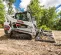 White, black and orange BOBCAT 2,000-2,400 lb. Compact Track Loader