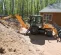 Orange and gray CASE 60-90 HP Backhoe Loader, 14 ft. Dig Depth
