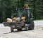 Orange and gray Case Backhoe Loader with 15 foot Dig Depth