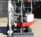 Red, white and gray TAKEUCHI 3,000-3,999 lb. Mini Excavator, Zero Tail Swing