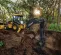 Yellow John Deere backhoe loader