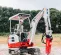 Red, white and black 4,200 lb. electric Mini Excavator