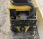 Yellow and black Vibratory Plate Compactor Attachment for Mini Excavator