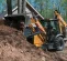 Orange and black Case Backhoe Loader with 17 foot Dig Depth and Extendahoe