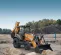 Orange and gray Case Backhoe Loader with 15 foot Dig Depth