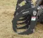 Gray Paladin Root Grapple Bucket Attachment on a Skid Steer
