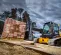 Yellow and black JCB 3,600 lb. Compact Track Loader with a Telescopic Boom