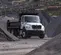 White and Black Freightliner Dump Truck