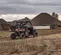 Brown Polaris Pro 4-seater UTV