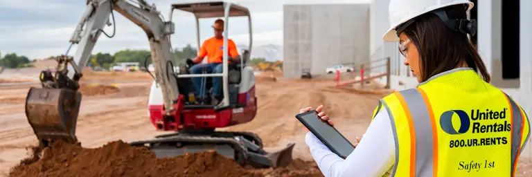 Jobsite excavator and tablet