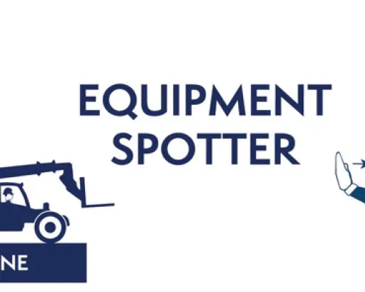 equipment spotter, construction worker holding up hand signal 