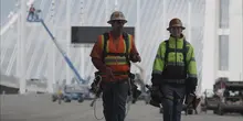 two men in hard hats on construction site