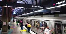 people boarding subway station in los angeles
