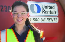 girl in ppe next to equipment