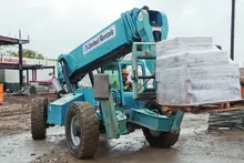 forklift carrying material