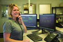 woman on phone at united rentals branch