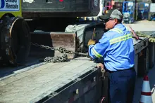 man loading truck with equipment