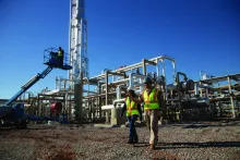 2 construction workers at power plant 