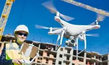 worker flying drone