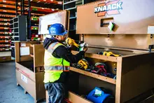 Worker using a power tool
