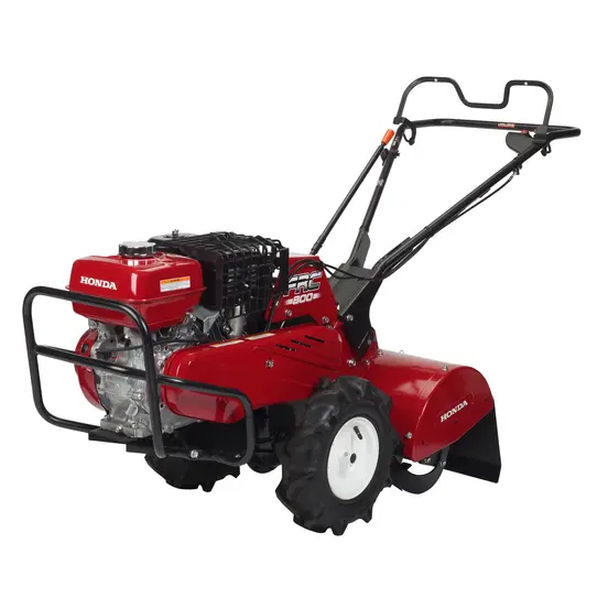 Red Honda 8 horsepower Walk-behind Rear Tine Tiller
